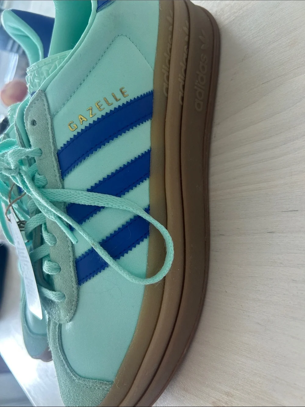 adidas Women’s Mint Green Sneakers with Blue Stripes